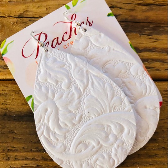 Embossed in White